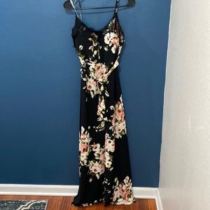Floor-length comfy black floral dress great for wedding guests and date nights!
